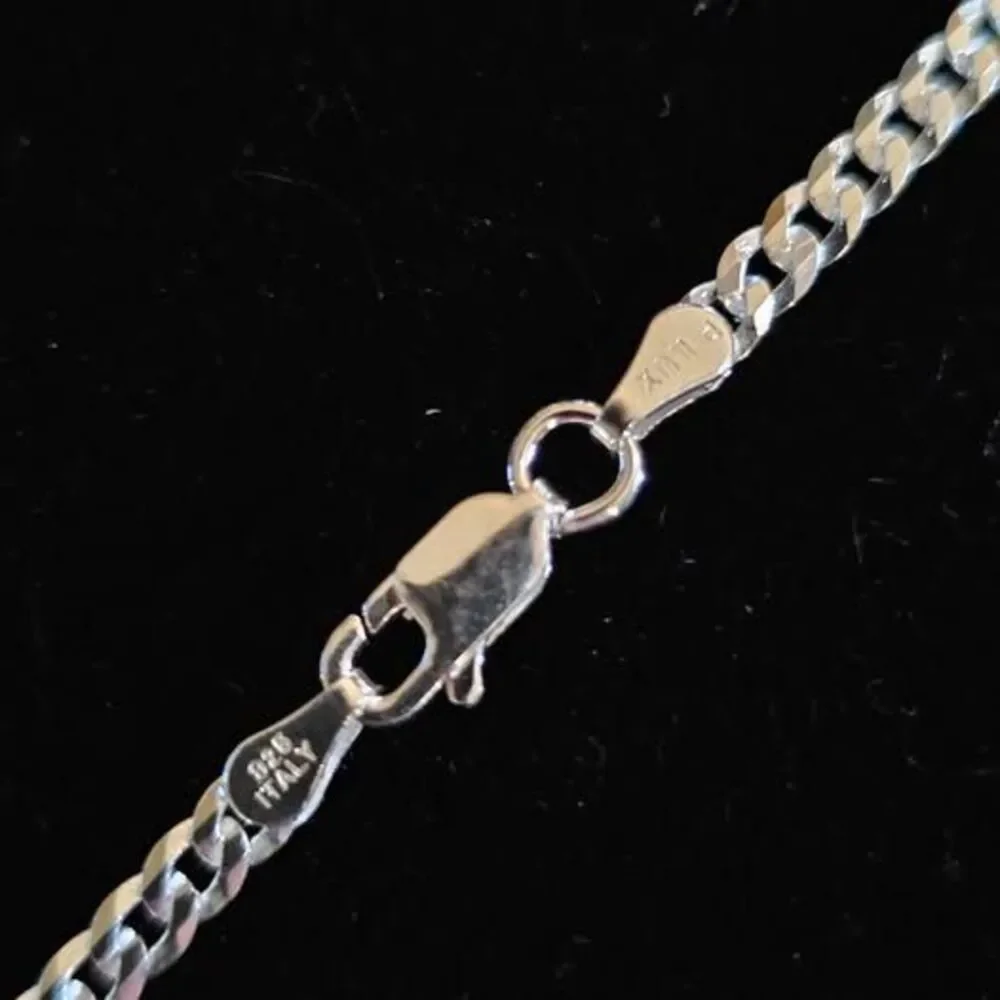 .87CTW VVSD Moissanite Ankh pendant in .925 sterling silver on 18